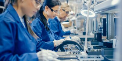 Employees working in an electronics factory.