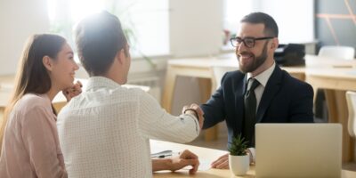 A couple meeting with a financial planner.