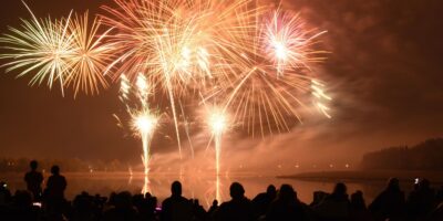 A photo of a crowd watching fireworks on Bonfire Night.